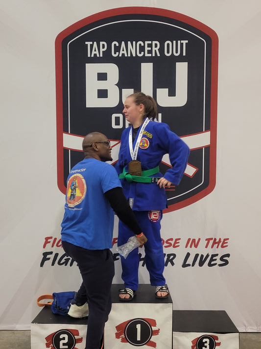 Coach Estelle Promoted to Green Belt